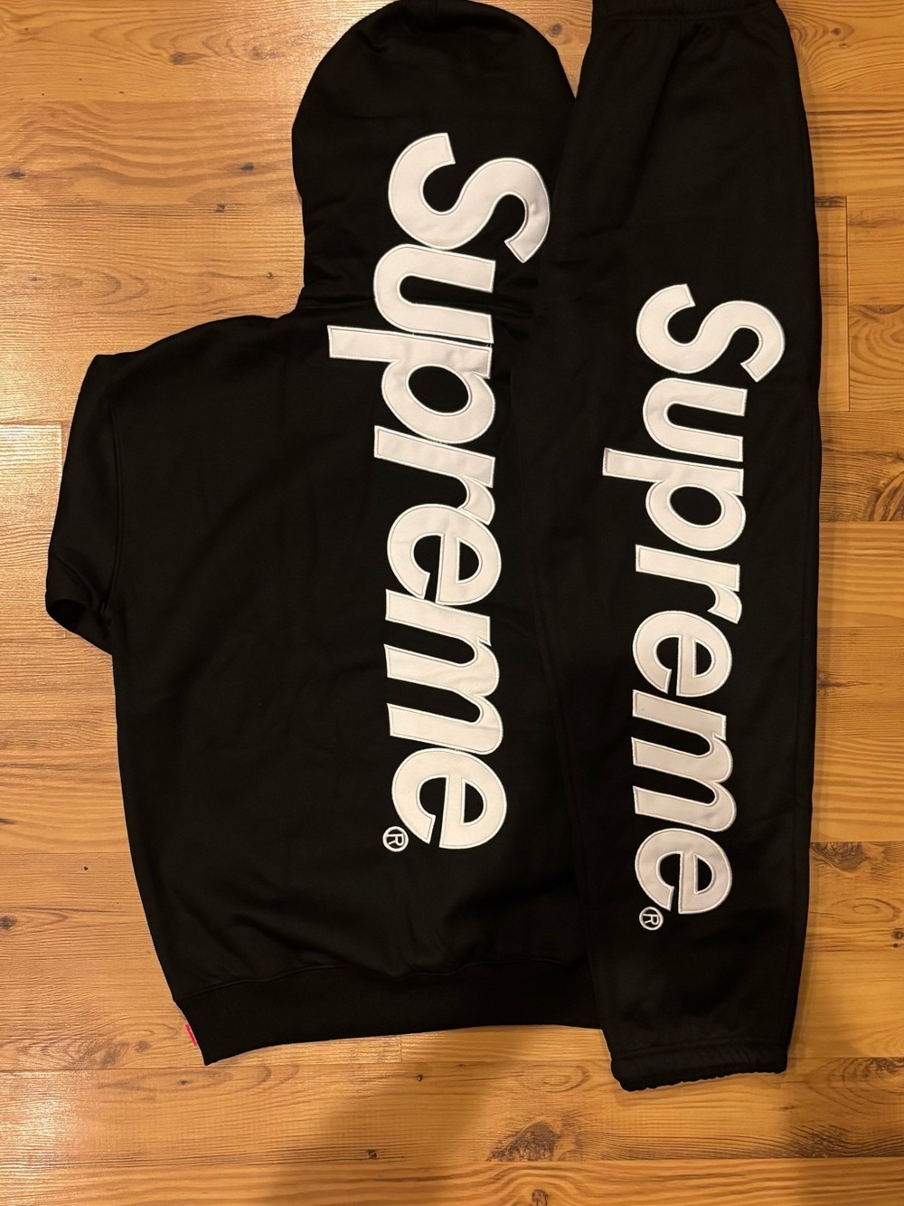 Supreme Black Hoodie with White Vertical Logo